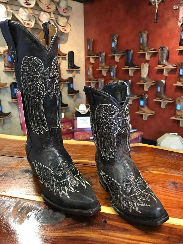 Cross and wing boots store